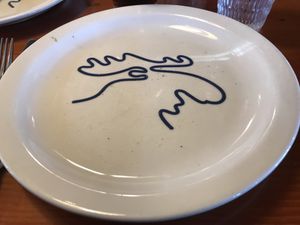 Even the plates are themed!  at Mooses Tooth in Anchorage