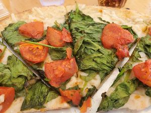 Cauliflower crust, vegan cheese tomato and spinach at Mooses Tooth in Anchorage
