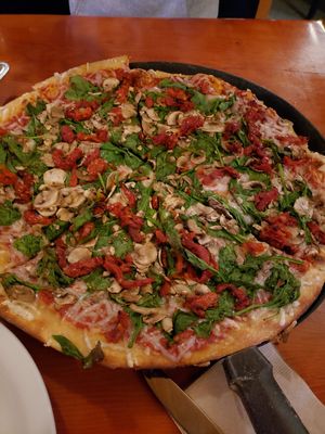 Vegan Pizza with Sundried Tomatoes, Spinach and Mushrooms at Mooses Tooth in Anchorage