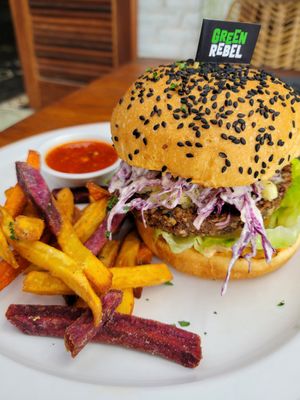 Green rebel burger with sweet potato fries at Manggis in Canggu in Canggu