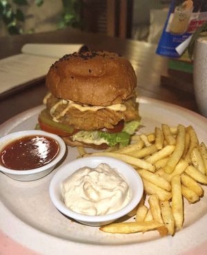 Crispy chicken burger and fries   at Manggis in Canggu in Canggu
