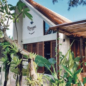 When designing our cafe we tried to combine Indonesian elements with modern touch. We focused on natural materials such as recycled wood and bamboo and worked with small local busi at Manggis in Canggu in Canggu
