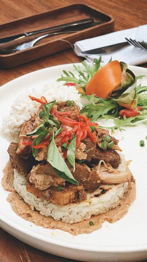 Jack Rendang
Rendang has been officially as one of 5 Indonesian national dishes. We swapped the beef for jackfruit but kept all the spices, with cracker and pan seared herb rice at Manggis in Canggu in Canggu