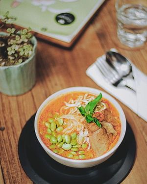 Spicy Bakso Laksa
Laksa is a popular rice noodle soup with shrimp paste, chili and coconut milk. We swapped the shrimp with traditional local spices. at Manggis in Canggu in Canggu