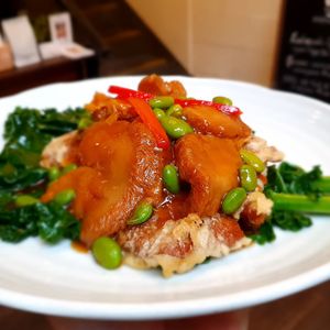 Braised Bearhead Mushroom on Crispy Vegan Duck and Greens at Brainwave Cafe in Sydney