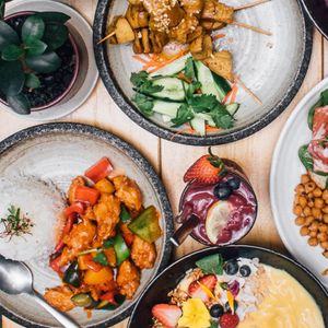 Sweet and Sour Vork, Malaysian Satay Skewers, Berry Smoothie and Mango smoothie Bowl at Brainwave Cafe in Sydney