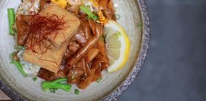 stirfried flat rice noodle with tofu at Brainwave Cafe in Sydney