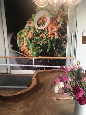 Huge table for community seating or large parties at Sustainabowl in Los Angeles