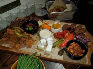 Vegan charcuterie, and basket of fried chicken at O.G.B. in Christchurch