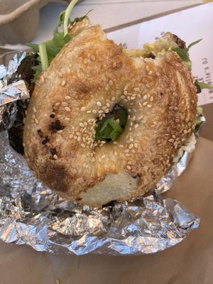 Vegan breakfast sandwich (with a bite lol) 2.5/5. I didn’t like it much  at Forage Market in Portland