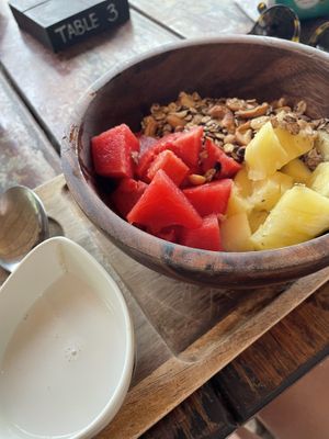Fruit with granola  at Benny's On The Beach in Koh Lipe