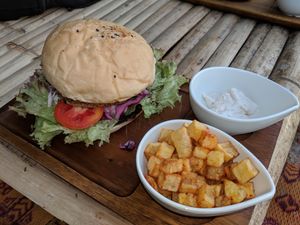 Burger with a side of potatoes, and aioli - all vegan :) at Benny's On The Beach in Koh Lipe