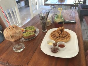 Vegetarian “chicken and waffles” made with deep fried avacados  at The Hangover in Puerto Viejo De Talamanca