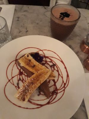 Banoffee pie with "love handles chocolate" hot drink (coconut, cacao and vanilla) at Redemption - Seven Dials in London