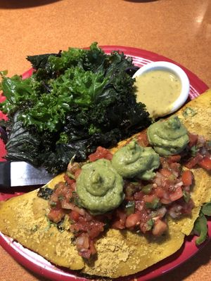 Besan chilla and tender sautéed kale with delicious curry sauce! at Duluth Grill in Duluth