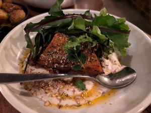 Slow-cooked pumpkin, tahini, tomato pesto, seeds at Three Blue Ducks in Ewingsdale