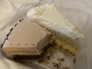 Vegan tiramisu (left) was better than the mango cake (right)   at Loving Hut - Barber Lane - Maybe closed in Milpitas