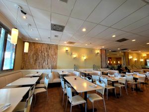 Seating area at Loving Hut - Barber Lane - Maybe closed in Milpitas