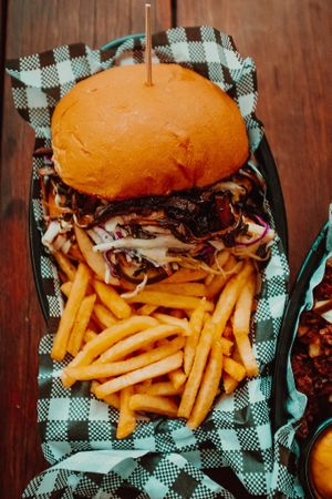 Burger and fries at MURDEReats in Leichhardt