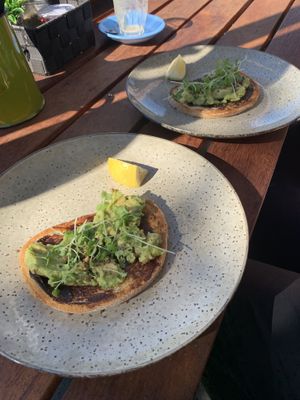 Sharing Avocado & vegemite on toast at Sticks & Grace in Newtown