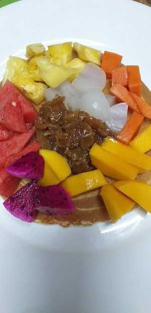 Fruit pancake with coconut and palm sugar syrup. Very good stuff. at Bar Ang in Battambang