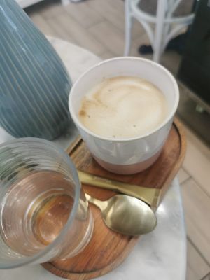 Oat milk cappucino at Omas Backstube in Vienna