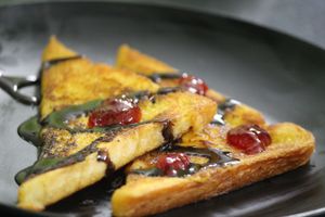 Cinnamon French Toast with Strawberry and Chocolate Toppings at Cafe VegaNation in Siliguri