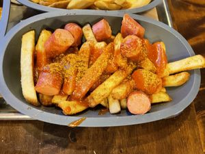 Curry sausage and fries  at Frittenwerk - Ehrenstraße in Cologne