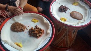Injera with lentil, mushroom, chickpea and pumpkin curry at Lucy in Cape Town