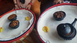 Curries before pouring on injera at Lucy in Cape Town