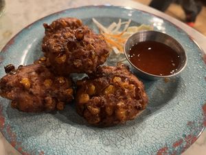 Sweetcorn fritters (quite bland)   at Rosa's Thai Cafe - Brixton in South West London