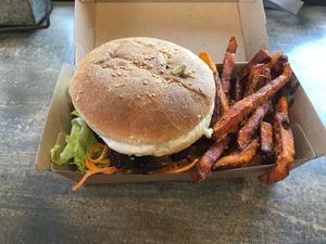 Lentil pattie vegan burger with sweet potato fries  at BayGer in Byron Bay
