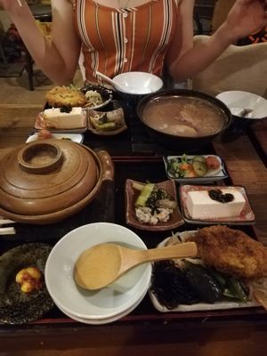 We went for the set menu, one with rice porridge and one with brown rice. Got extra plates so we could share at Sawa in Osaka