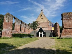 Old ruined church opposite with pleasant carillon
 at ECHT in Bergen
