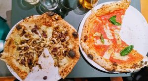 Pizza funghi (top) and marinara, both with vegan cheese at Happy Face Pizza in North London