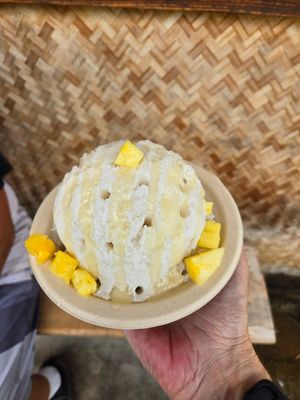 The Big Island: pineapple lime with coconut condensed milk and pineapple chunks! Super yum! at Kula Shave Ice in Hilo