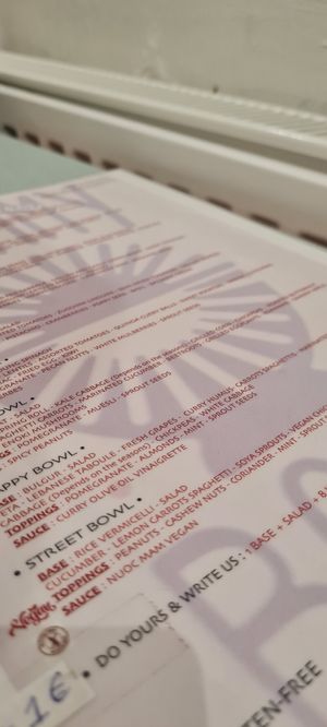 Clearly labeled "vegan" options at Yummy Bowl in Brussels