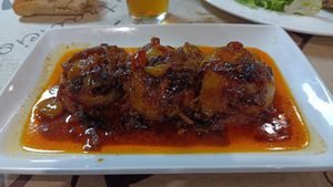 Cipolle ripiene con pesto asturiano e funghi. at La Teya in Pola De Siero