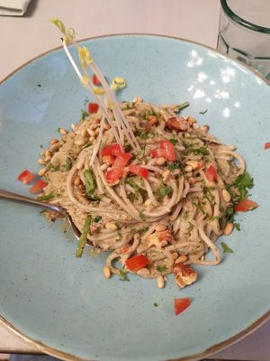 'The Godfather' pasta: spaghetti with roasted nuts, fresh herbs, white wine, sun-dried tomatoes, eggplant and soy cream. at Epiphany's Kitchen in Ghent