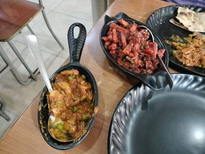 Matar mushroom and crispy chili potatoes at Tadka4986 in New Delhi