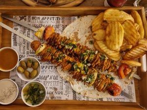 Chicken skewer at Hummus Bar in Haifa