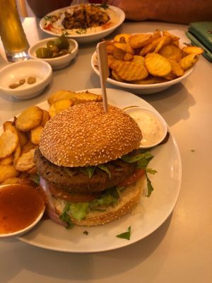 Delicious burger with the house patty  at Hummus Bar in Haifa