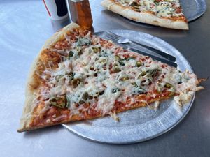 Vegan pizza with jalapeños, basil, and garlic  at Lazy Moon Pizza - Colonial Dr in Orlando