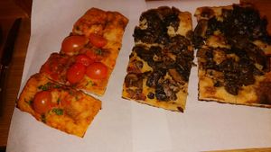 Arabiata and mushroom pizza at Sugo Pizza Al Taglio in Eindhoven