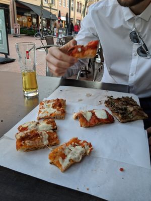 Pizza and peroni. at Sugo Pizza Al Taglio in Eindhoven