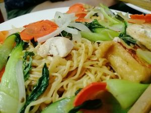 A piece of Chicken in my Tofu Stir Fry.  at lus in Hanoi