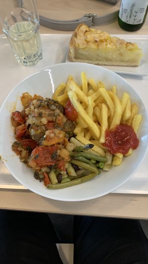Veggie-balls menu is vegan is you ask for fries instead of mashed potatoes. Apple cake in the background. at IKEA in Lyssach
