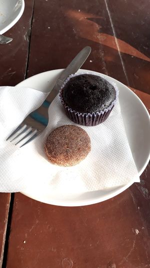 Vegan chocolate muffin and cookie at Brown Bread Bakery in Varanasi