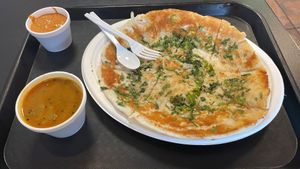Onion chili uttapam   at Shreeji Indian Vegetarian Street Food in Louisville