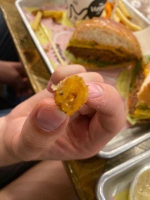 Empty fauxzarella stick (the cheese had leaked out) at The Vurger Co - Canary Wharf in East London